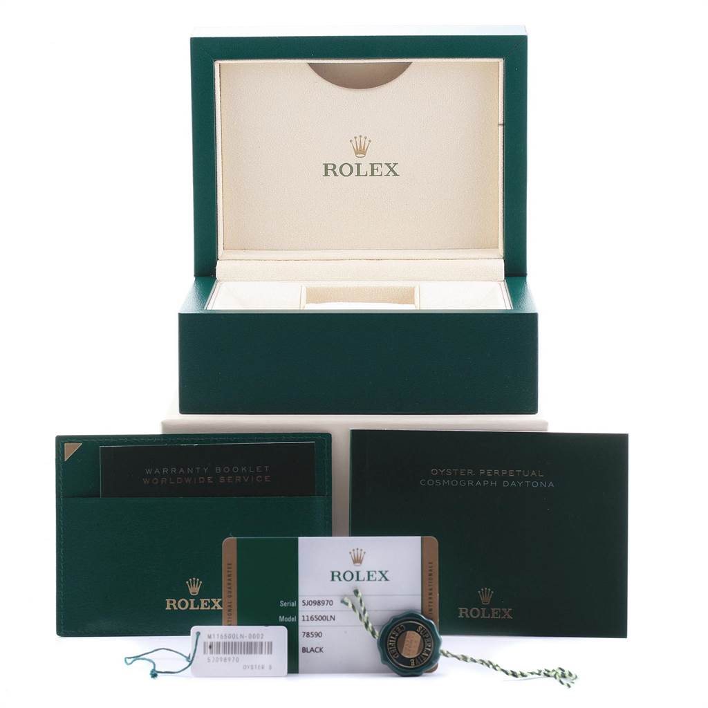 The image shows the box, warranty booklet, and certification card for a Rolex Daytona 116500 Men's Stainless Steel Black Dial 116500 Men's Stainless Steel Black Dial watch.