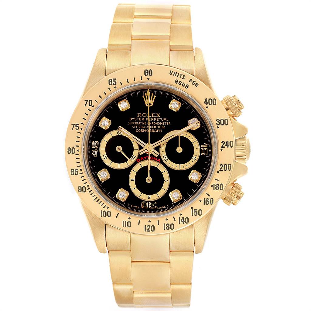 This Rolex Daytona 16528 Men's Yellow Gold Black Dial 16528 Men's Yellow Gold Black Dial watch is shown from the front, displaying its dial, bezel, case, and part of the bracelet.
