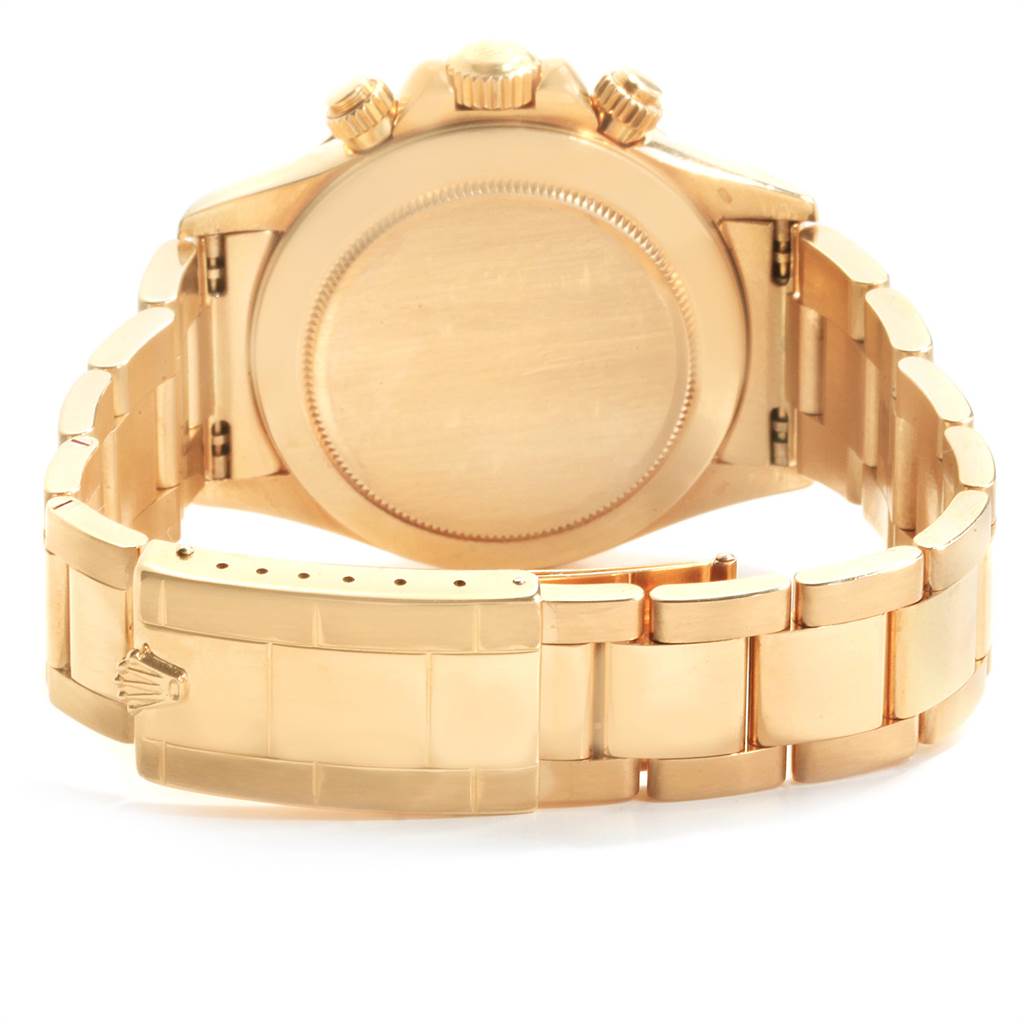 This image shows the back and clasp of a Rolex Daytona 16528 Men's Yellow Gold Black Dial 16528 Men's Yellow Gold Black Dial watch in gold, taken from a rear angle.