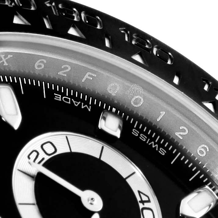Close-up of the dial and bezel of a Rolex Daytona 116500 Men's Stainless Steel Black Dial 116500 Men's Stainless Steel Black Dial watch, showing part of the chronograph subdial and tachymeter scale.