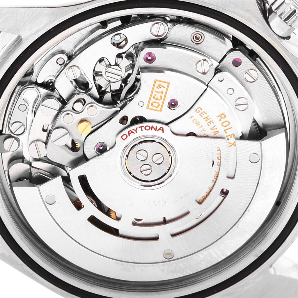This image shows the intricate inner mechanism of a Rolex Daytona 116500 Men's Stainless Steel Black Dial 116500 Men's Stainless Steel Black Dial watch from a close-up angle.