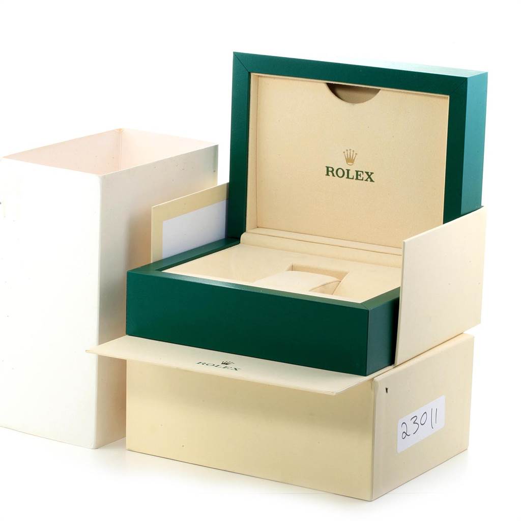 This image shows the open box and packaging of a Rolex Daytona 116509 Men's White Gold Black Dial 116509 Men's White Gold Black Dial model watch from a front angle.