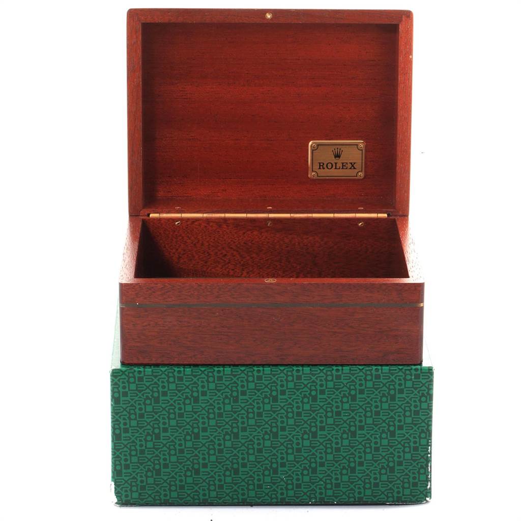 The image shows the open wooden display box for a Rolex Daytona 16519 Men
s White Gold White Dial 16519 Men
s White Gold White Dial watch, revealing its interior with the Rolex logo inside the lid.
