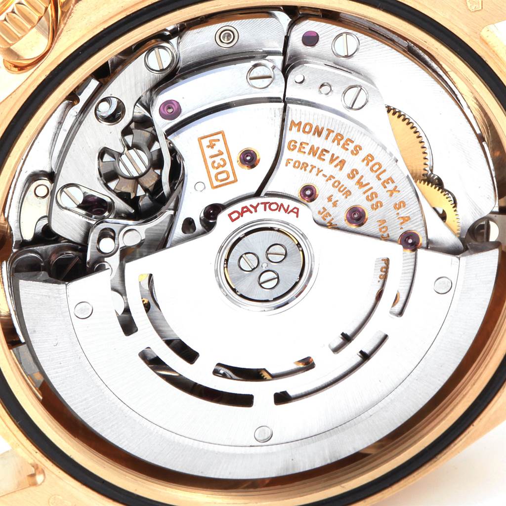 This image shows the intricate inner mechanism and rotor of a Rolex Daytona 116528 Men's Yellow Gold Champagne Dial 116528 Men's Yellow Gold Champagne Dial watch from an internal angle.