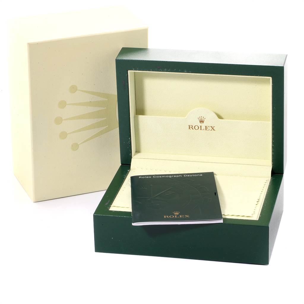 The image shows a Rolex Daytona 116520 Men
s Stainless Steel Black Dial 116520 Men
s Stainless Steel Black Dial watch box, outer box, and instruction manual at a front-facing angle.