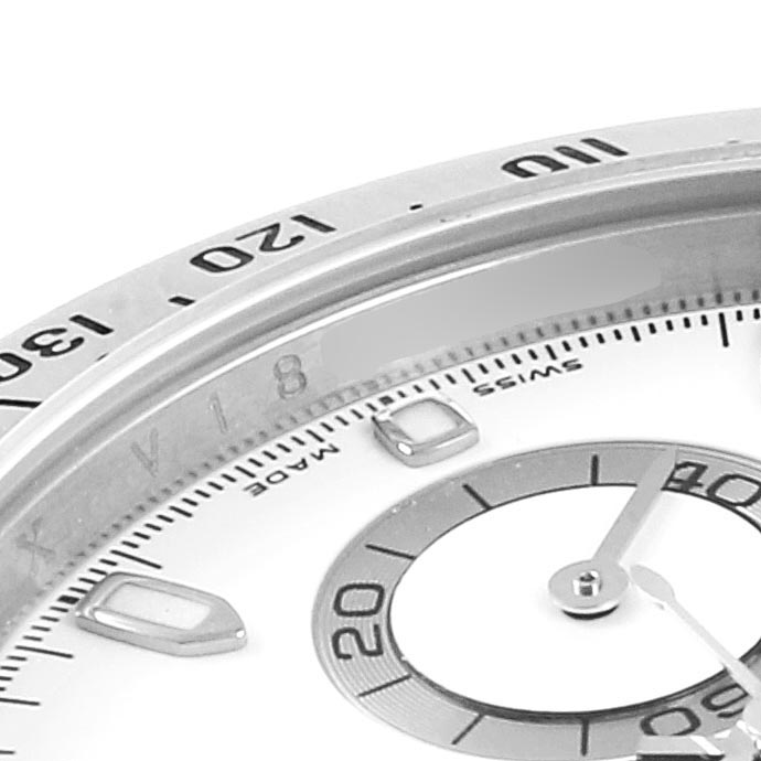 This image shows the top-left portion of the dial and bezel of a Rolex Daytona 116520 Men's Stainless Steel White Dial 116520 Men's Stainless Steel White Dial watch.