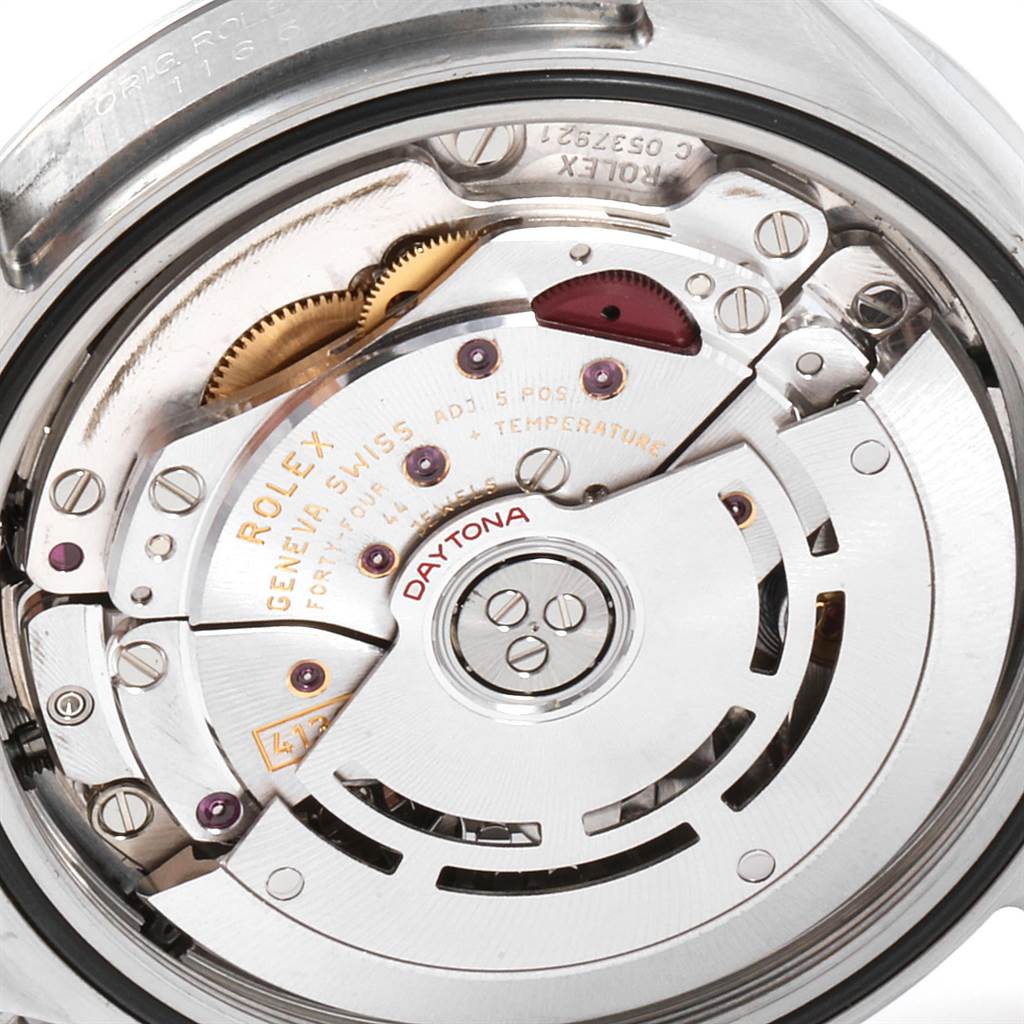 The image shows the intricate internal movement of a Rolex Daytona 116520 Men's Stainless Steel Black Dial 116520 Men's Stainless Steel Black Dial watch from a top-down angle.