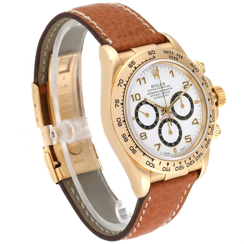 The image shows a side-angle view of a Rolex Daytona 16518 Men's Yellow Gold White Dial 16518 Men's Yellow Gold White Dial watch, highlighting its gold case, white dial, and brown leather strap.