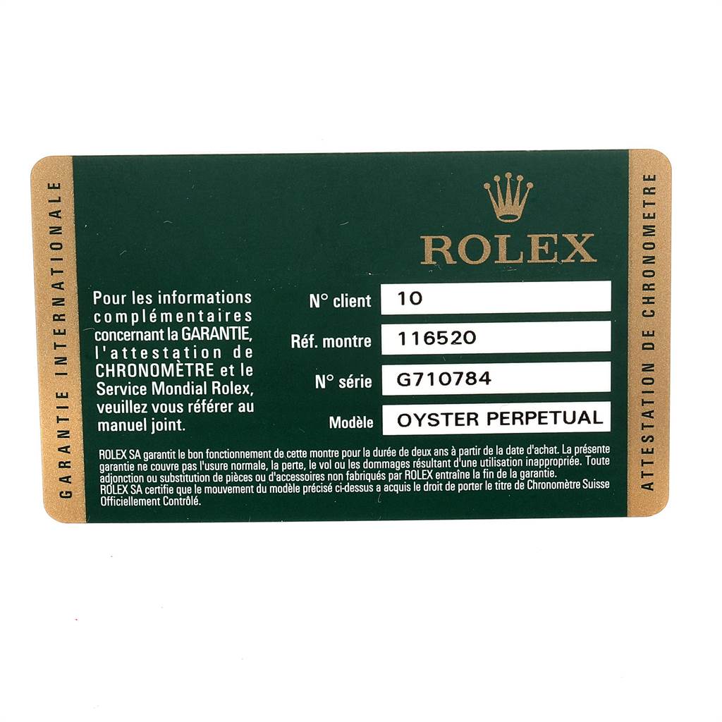 This image shows a Rolex Daytona 116520 Men's Stainless Steel Black Dial 116520 Men's Stainless Steel Black Dial model warranty card with model and serial numbers.