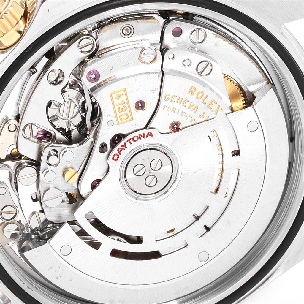 This image shows the movement parts of a Rolex Daytona 116523 Men's Steel and Gold (two tone) White Dial 116523 Men's Steel and Gold (two tone) White Dial watch, viewed from the back with the rotor and gears visible.