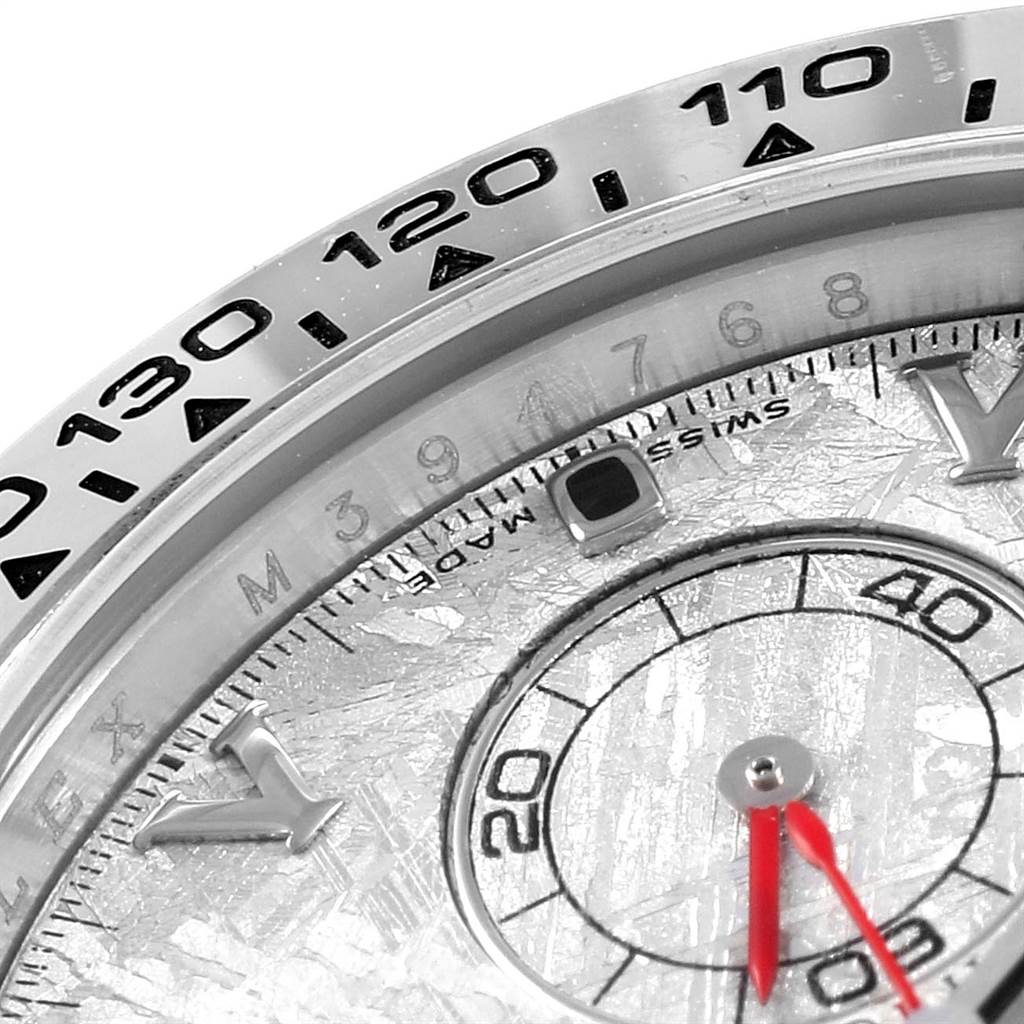This image shows a close-up of the dial and bezel of a Rolex Daytona 116509 Men's White Gold Silver Dial 116509 Men's White Gold Silver Dial watch, highlighting the minute markers and sub-dial.