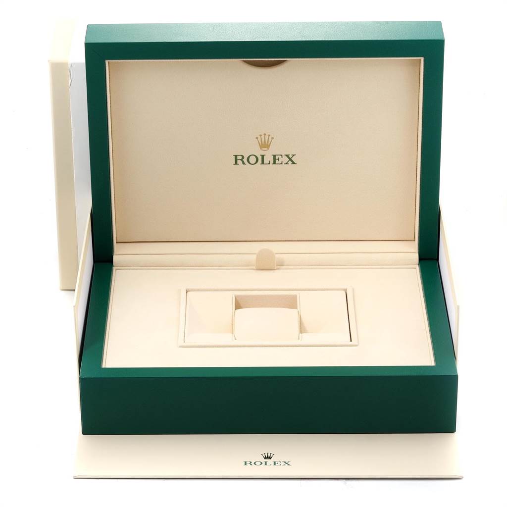 The image shows an open Rolex Daytona 116509 Men's White Gold Silver Dial 116509 Men's White Gold Silver Dial watch box with a green exterior and beige interior at a front angle.