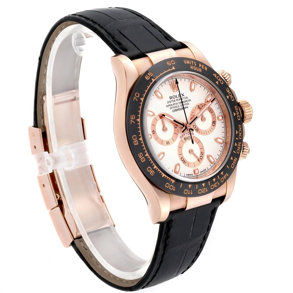 The Rolex Daytona 116515LN Men's Rose Gold Silver Dial 116515LN Men's Rose Gold Silver Dial watch is shown from a front-left angle, displaying its face, bezel, crown, pushers, and leather strap.