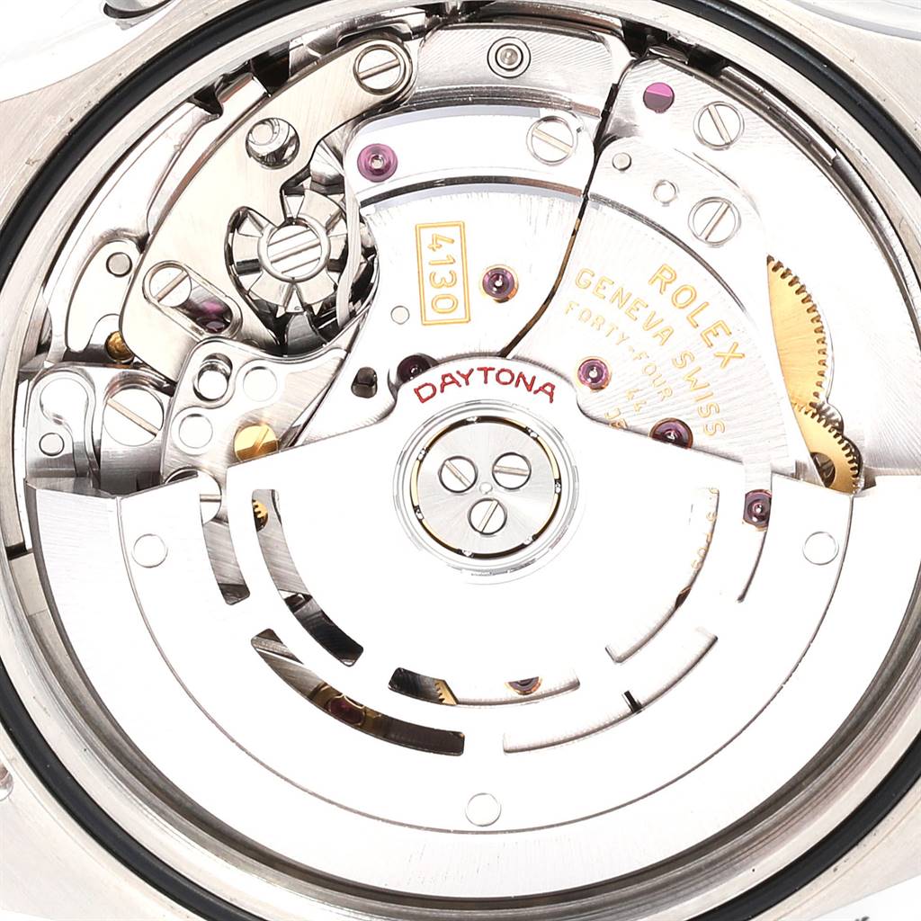 The image shows the movement of a Rolex Daytona 116520 Men's Stainless Steel Black Dial 116520 Men's Stainless Steel Black Dial watch, viewed from the back, highlighting its intricate mechanical components.