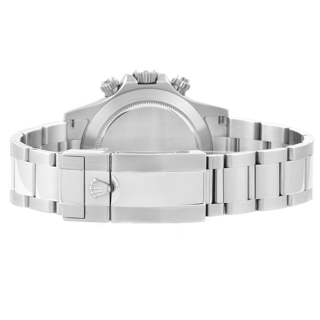 The image shows the back view of a Rolex Daytona 116520 Men's Stainless Steel Black Dial 116520 Men's Stainless Steel Black Dial watch, focusing on its clasp, bracelet, and case back.