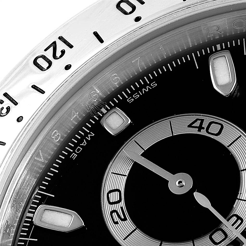 This image shows a close-up of the dial and bezel on a Rolex Daytona 116520 Men's Stainless Steel Black Dial 116520 Men's Stainless Steel Black Dial watch.