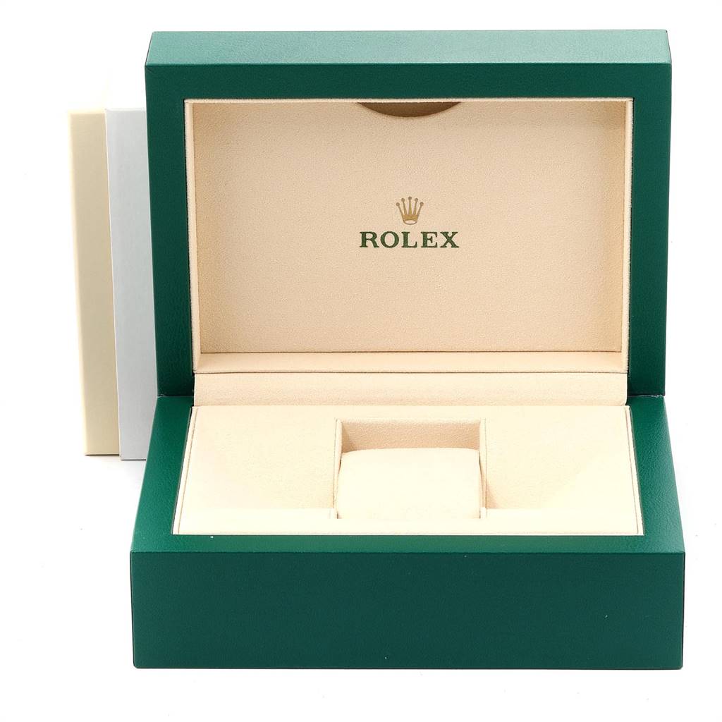 The image shows an empty Rolex Daytona 116520 Men's Stainless Steel Black Dial 116520 Men's Stainless Steel Black Dial watch box, featuring green exterior and beige interior with the Rolex logo.