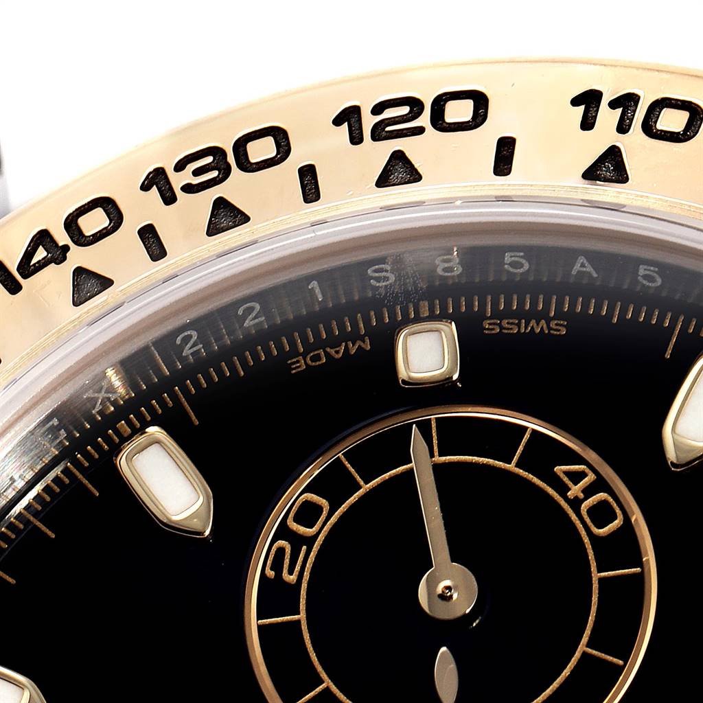 This close-up angle of a Rolex Daytona 116503 Men's Steel and Gold (two tone) Black Dial 116503 Men's Steel and Gold (two tone) Black Dial watch shows part of the bezel and sub-dial.