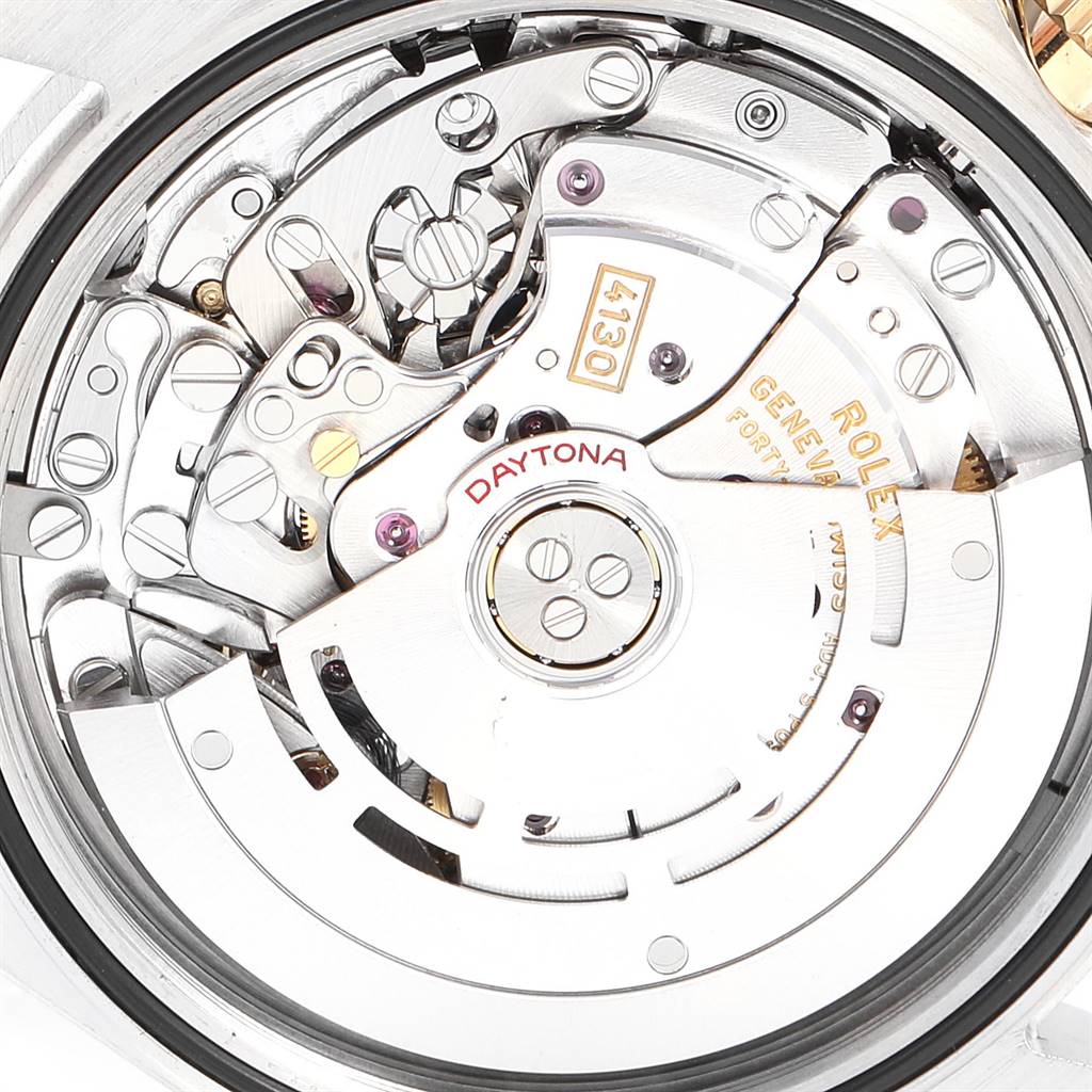 This image shows the intricate inner mechanics and rotor of a Rolex Daytona 116503 Men's Steel and Gold (two tone) Black Dial 116503 Men's Steel and Gold (two tone) Black Dial model watch from a close-up, top-down angle.