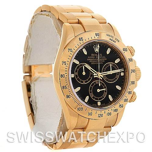 This image shows a Rolex Daytona 116528 Men's Yellow Gold Black Dial 116528 Men's Yellow Gold Black Dial watch at an angled frontal view, revealing its gold case, black dial, and part of the strap.
