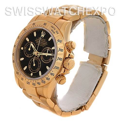 The image shows a side angle of the Rolex Daytona 116528 Men's Yellow Gold Black Dial 116528 Men's Yellow Gold Black Dial watch, highlighting the case, dial, bracelet, and chronograph pushers.