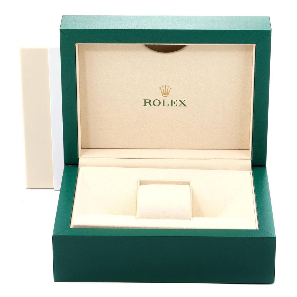 The image shows an open, empty Rolex watch box for the Daytona model, viewed from the front angle.