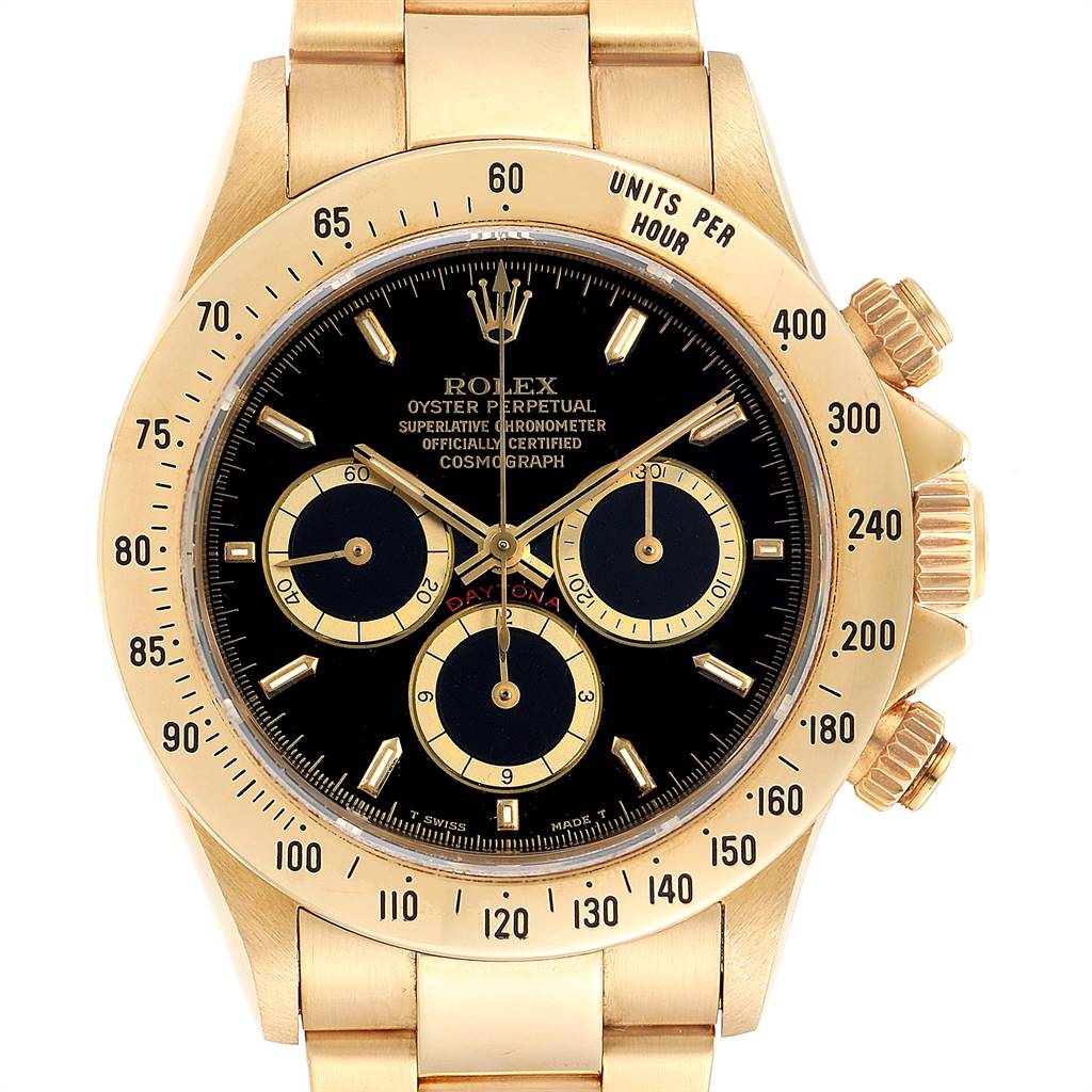 The image shows a front view of a Rolex Daytona 16528 Men's Yellow Gold Black Dial 16528 Men's Yellow Gold Black Dial watch, showcasing its dial, bezel, and part of the bracelet.