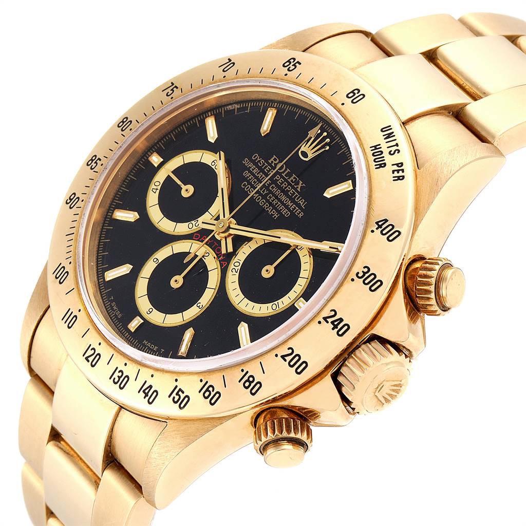 The image shows a side angle of the Rolex Daytona 16528 Men's Yellow Gold Black Dial 16528 Men's Yellow Gold Black Dial watch, displaying the dial, bezel, and crown.