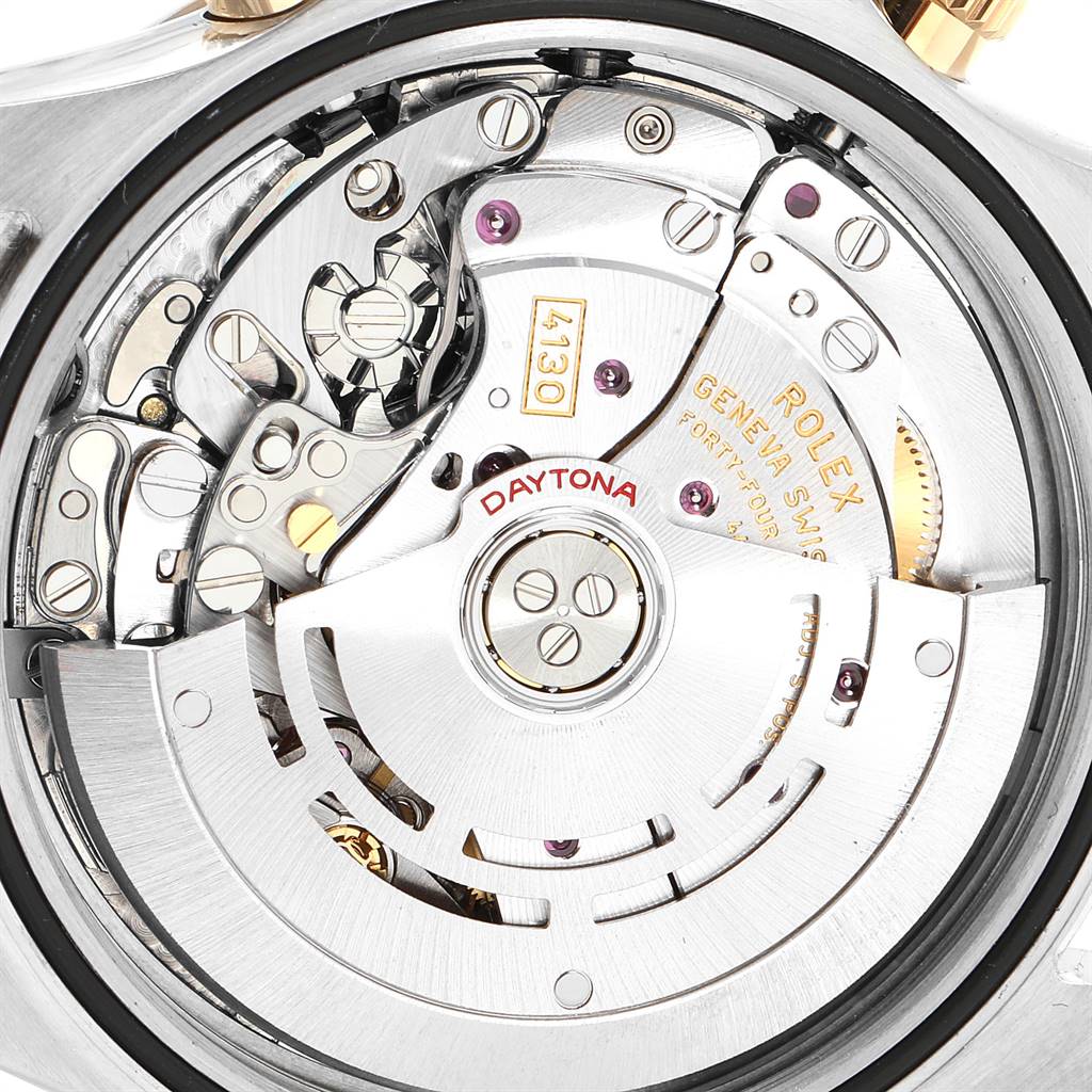 This image shows a close-up view of the movement mechanism of a Rolex Daytona 116523 Men's Steel and Gold (two tone) Blue Dial 116523 Men's Steel and Gold (two tone) Blue Dial watch.