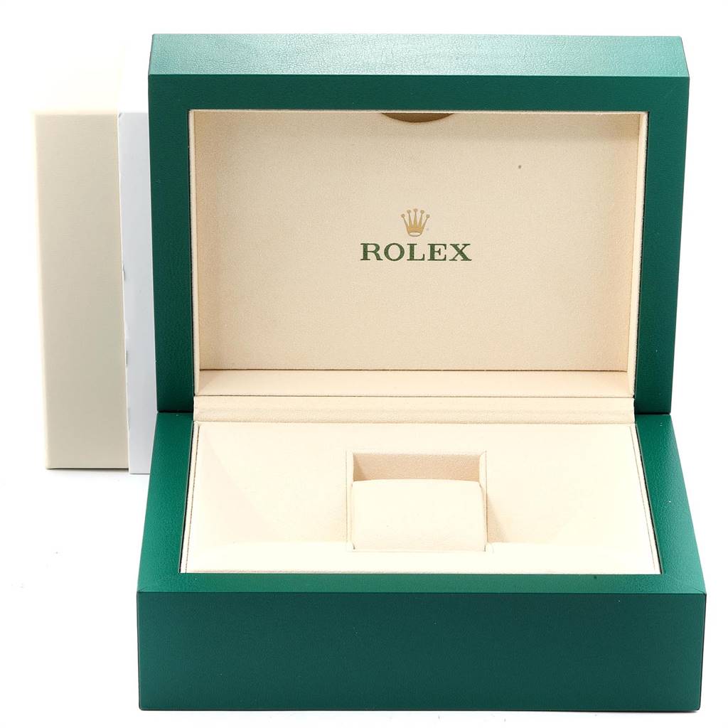This image shows an open green Rolex box for a Daytona model watch, displaying the interior without the watch.