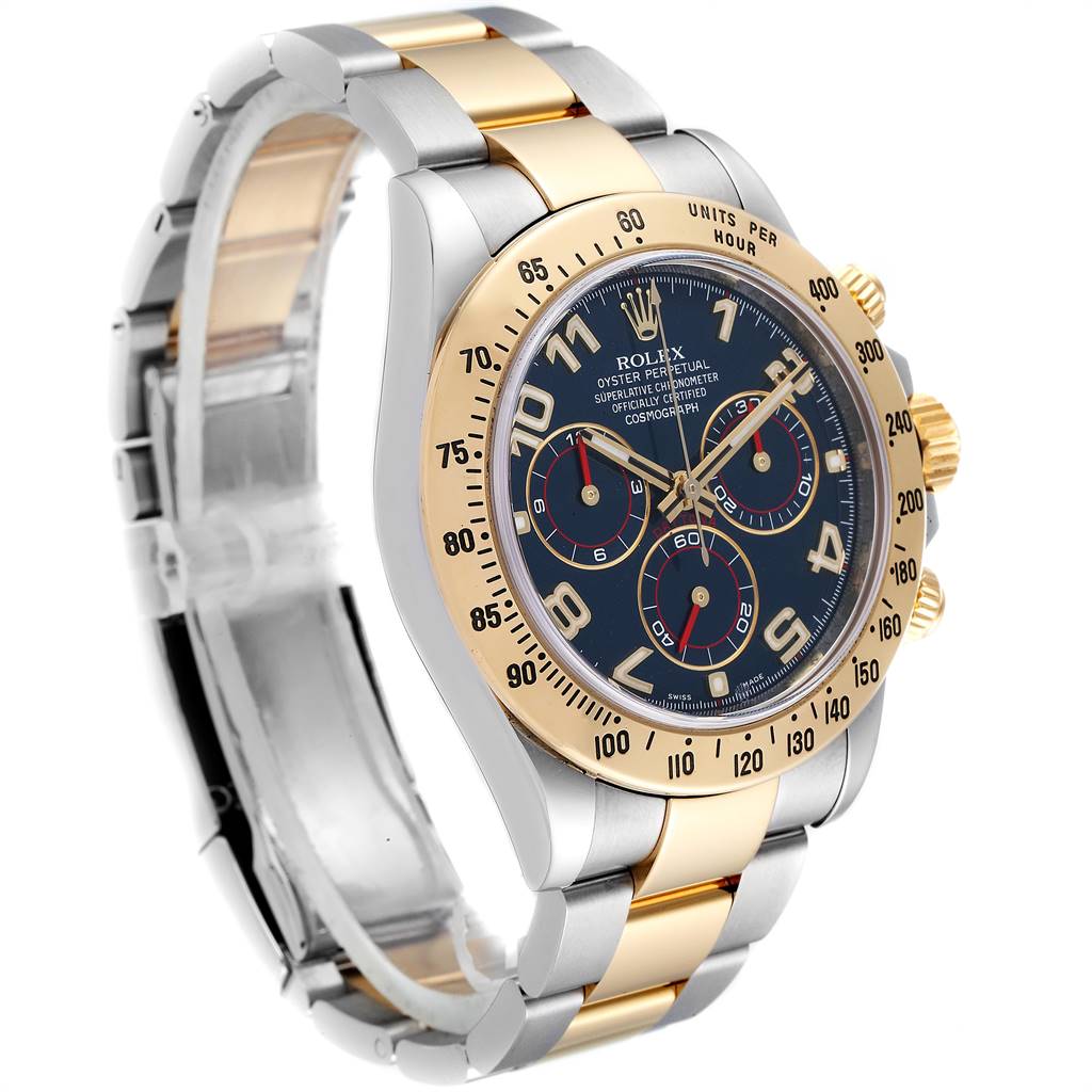 The image shows a Rolex Daytona 116523 Men's Steel and Gold (two tone) Blue Dial 116523 Men's Steel and Gold (two tone) Blue Dial watch at an angled view, highlighting its dial, bezel, and bracelet.