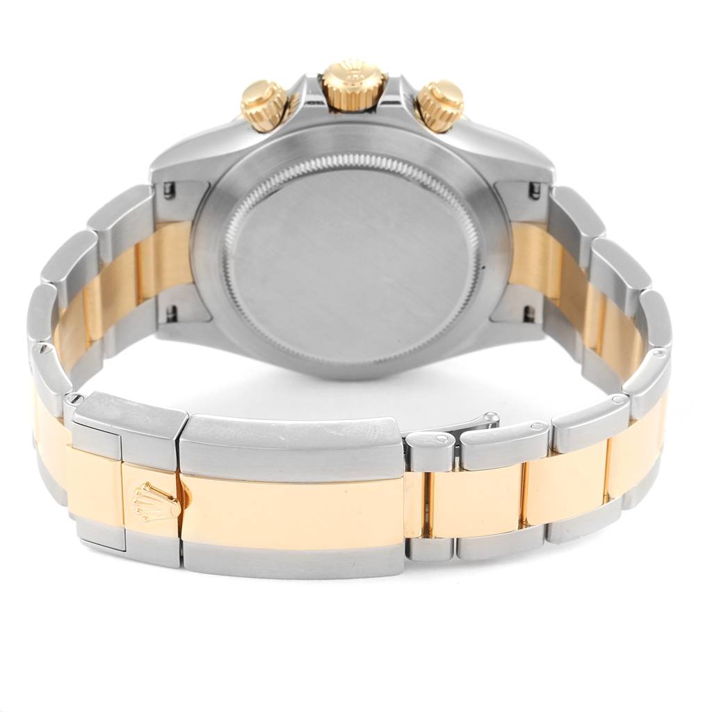 This image shows the back case and bracelet of a Rolex Daytona 116523 Men's Steel and Gold (two tone) Blue Dial 116523 Men's Steel and Gold (two tone) Blue Dial watch, highlighting the clasp and chronograph pushers.