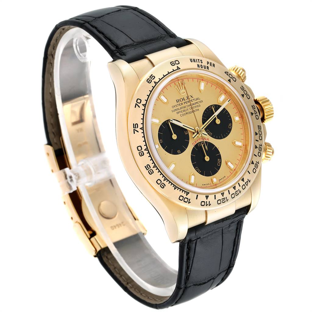 The Rolex Daytona 116518 Men's Yellow Gold Champagne Dial 116518 Men's Yellow Gold Champagne Dial watch is shown from an angled side view, displaying its gold case, black leather strap, and three sub-dials.