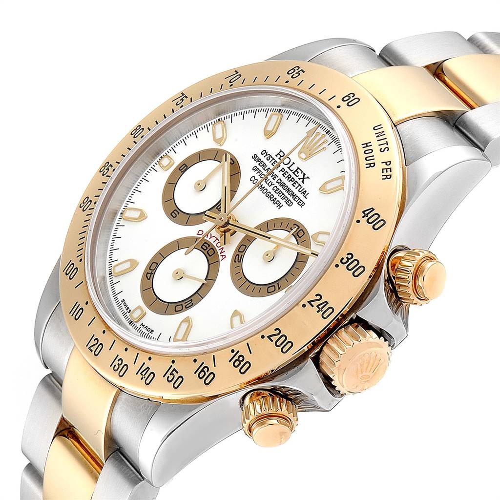 The image shows a Rolex Daytona 116523 Men's Steel and Gold (two tone) White Dial 116523 Men's Steel and Gold (two tone) White Dial watch at an angled close-up, highlighting the crown, bezel, sub-dials, and part of the bracelet.