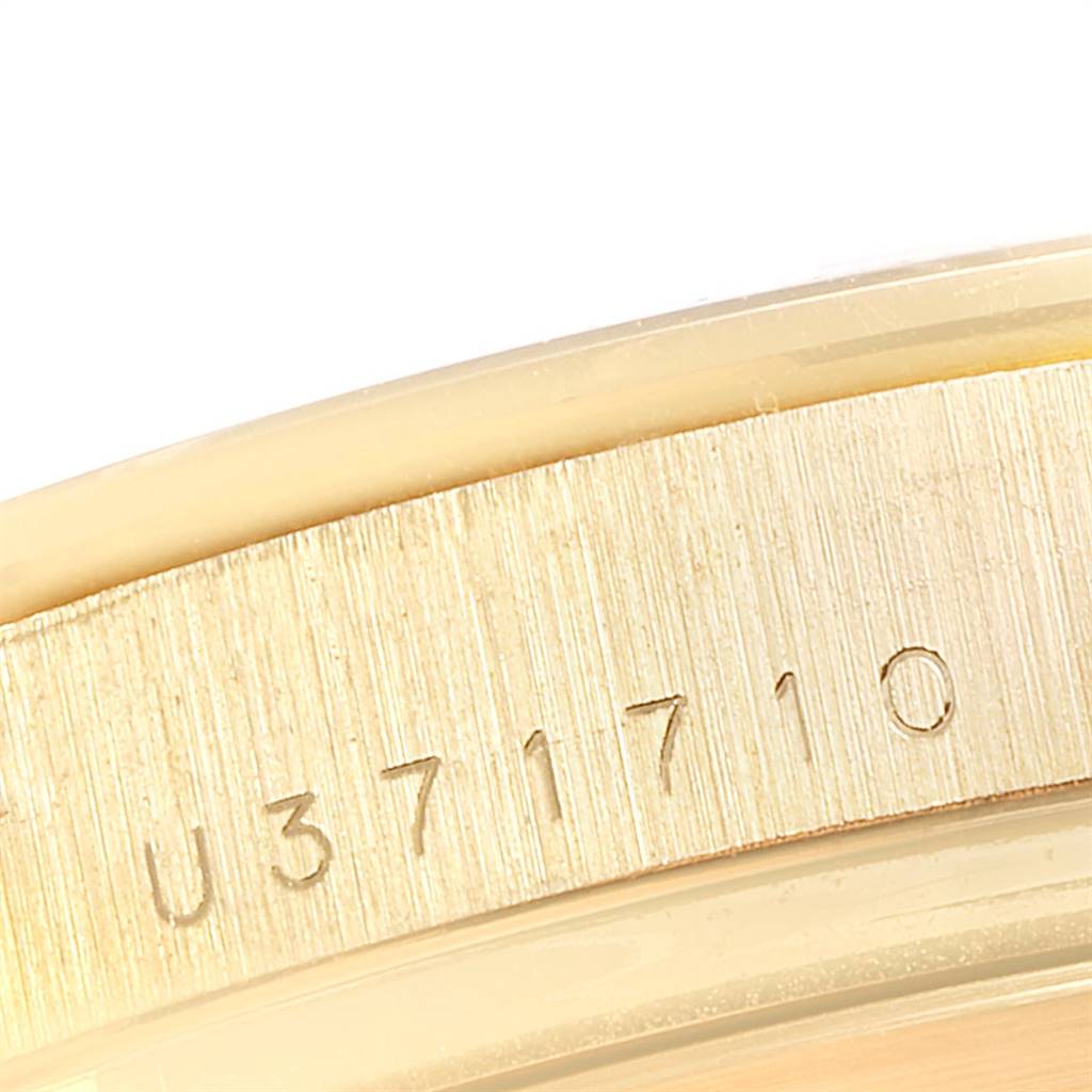 This image shows a close-up of the model number engraving on the case of a Rolex Daytona 16528 Men's Yellow Gold White Dial 16528 Men's Yellow Gold White Dial watch.