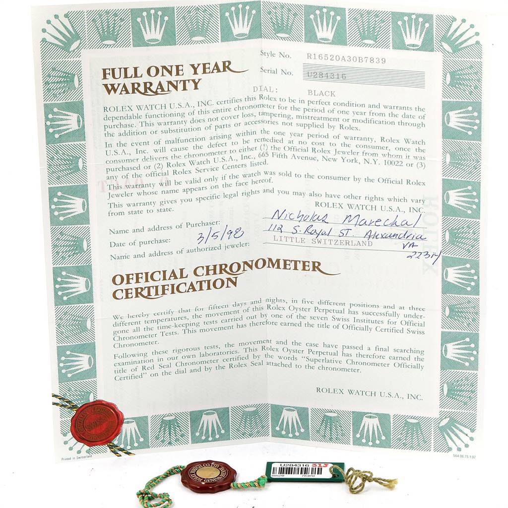 This image shows the warranty and official chronometer certification documents for a Rolex Daytona 16520 Men's Stainless Steel Black Dial 16520 Men's Stainless Steel Black Dial watch, along with the original tags.