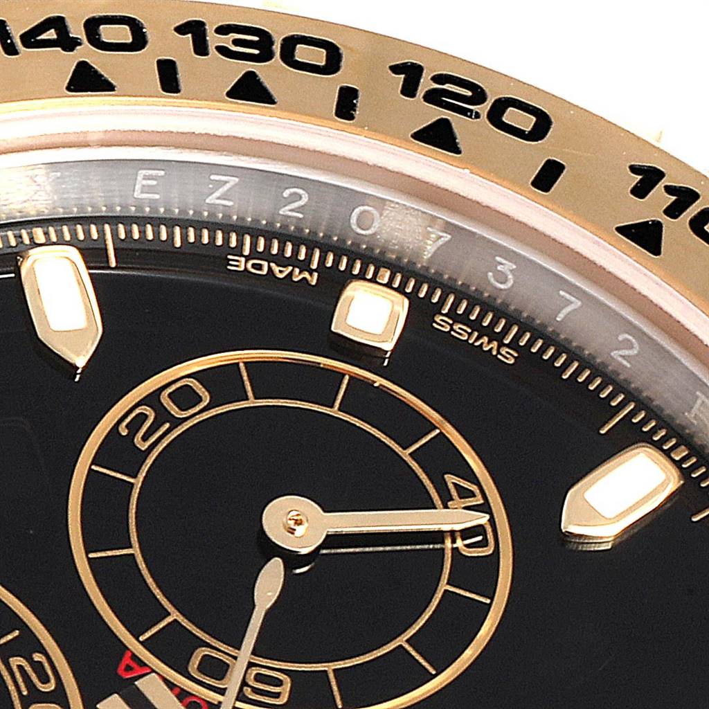 The image shows a close-up of the dial and bezel of a Rolex Daytona 116503 Men's Steel and Gold (two tone) Black Dial 116503 Men's Steel and Gold (two tone) Black Dial watch with a black and gold design.