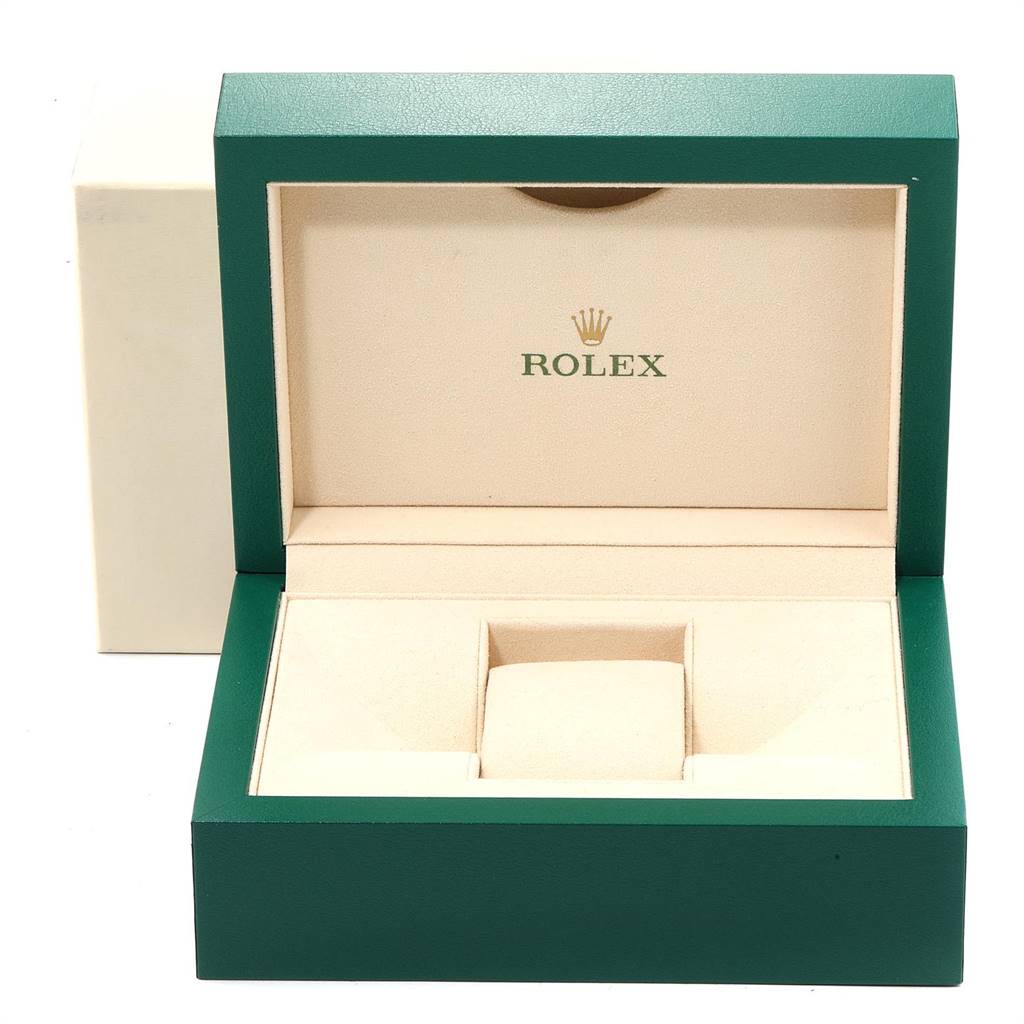 This image shows an empty Rolex Daytona 116503 Men's Steel and Gold (two tone) Black Dial 116503 Men's Steel and Gold (two tone) Black Dial watch box, including the cushion and the brand logo inside.