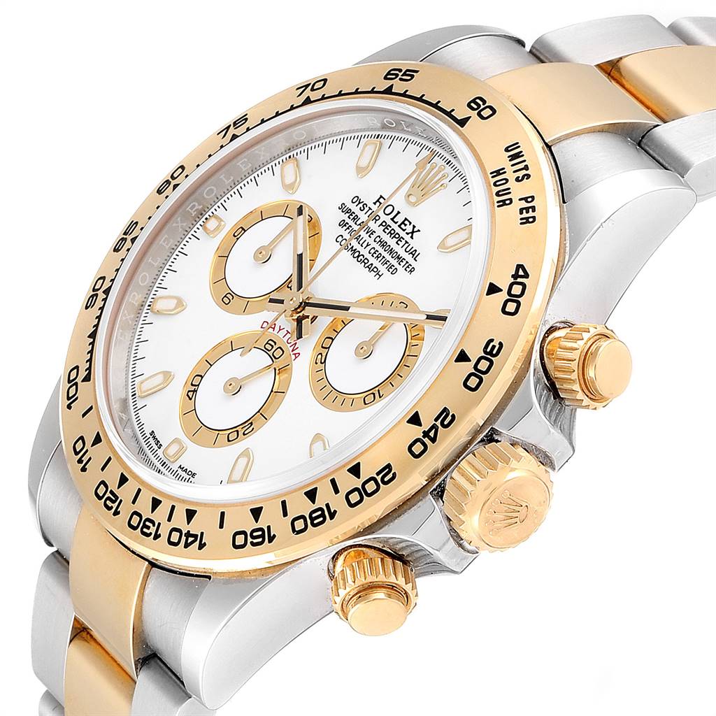 This image shows a close-up 3/4 angled view of the Rolex Daytona 116503 Men's Steel and Gold (two tone) White Dial 116503 Men's Steel and Gold (two tone) White Dial watch, highlighting its dial, bezel, crown, and pushers.