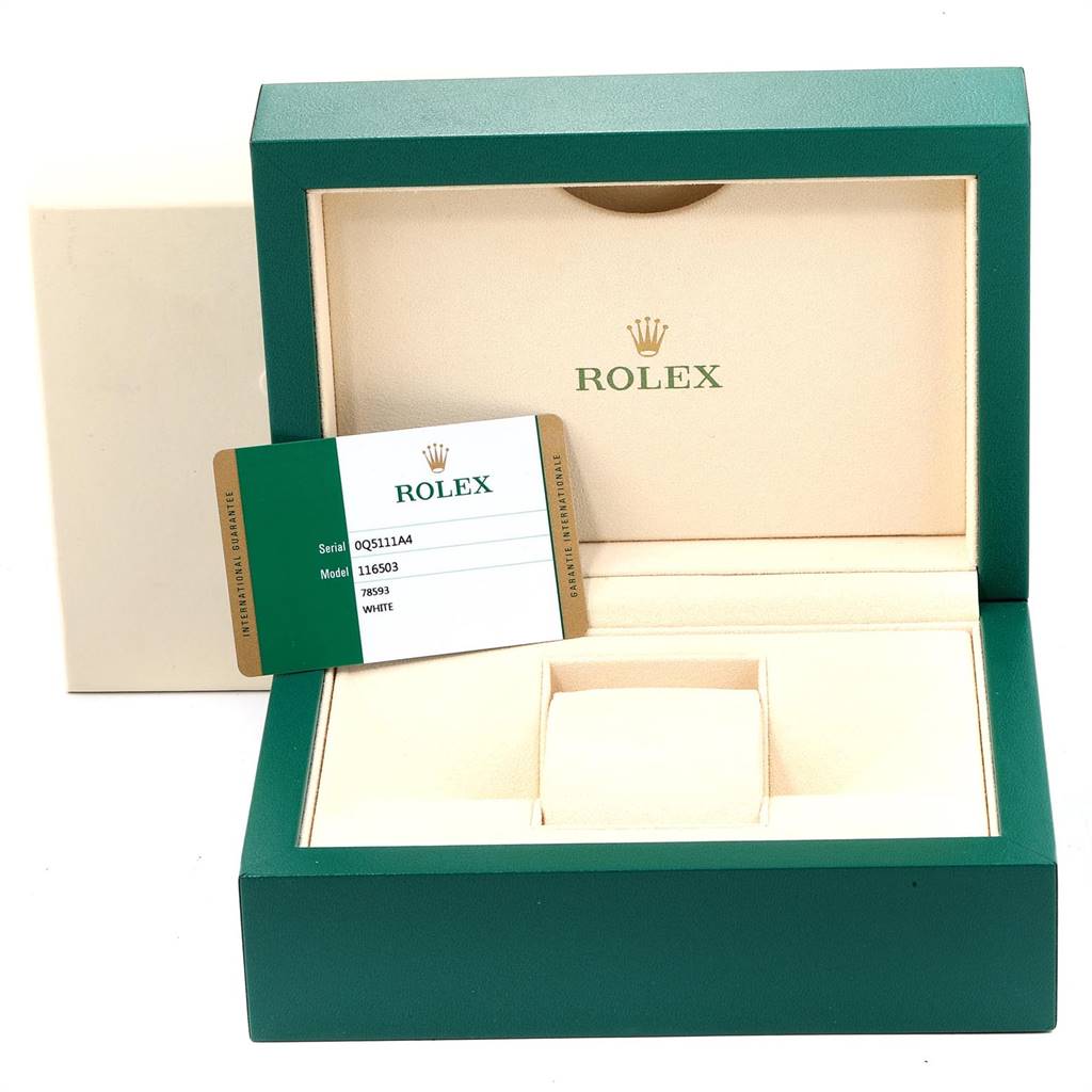 This image shows the open packaging box for a Rolex Daytona 116503 Men's Steel and Gold (two tone) White Dial 116503 Men's Steel and Gold (two tone) White Dial watch with its authenticity card.