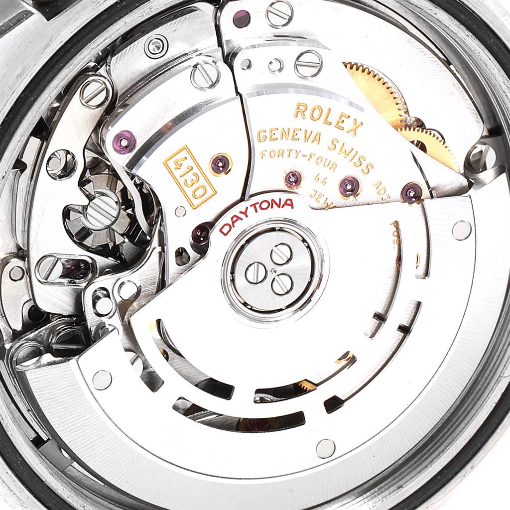 The image shows the intricate internal mechanism of the Rolex Daytona 116523 Men's Steel and Gold (two tone) Silver Dial 116523 Men's Steel and Gold (two tone) Silver Dial watch, focusing on the movement component.