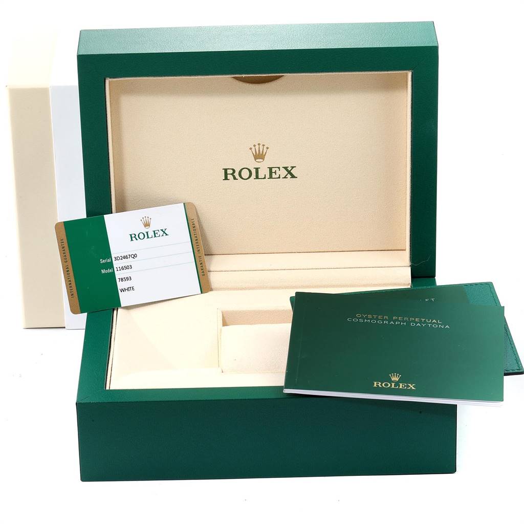 The image shows the open box, guarantee card, and manual of a Rolex Daytona 116503 Men's Steel and Gold (two tone) White Dial 116503 Men's Steel and Gold (two tone) White Dial watch.