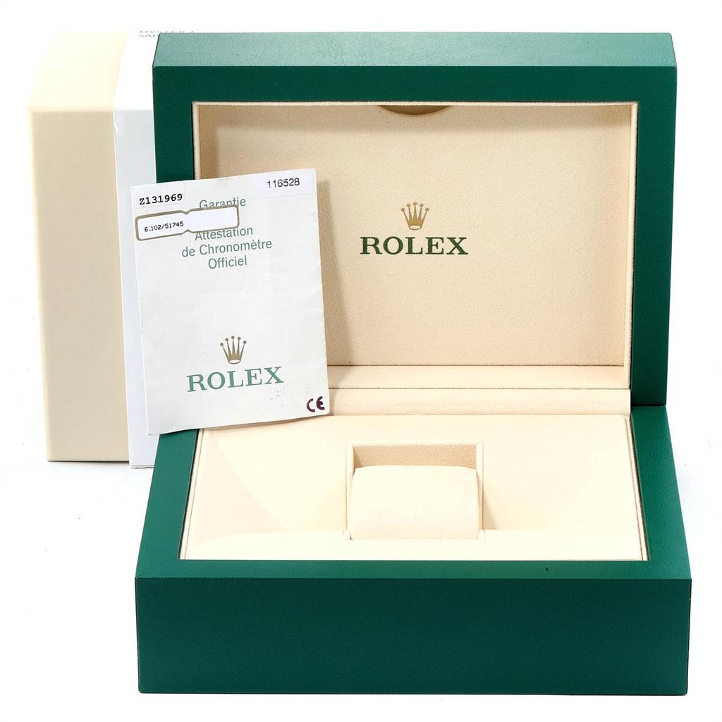 The image shows an open green and cream Rolex Daytona 116528 Men's Yellow Gold White Dial 116528 Men's Yellow Gold White Dial watch box with official certification documents.