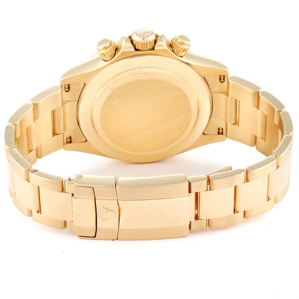 This image shows the back view of a Rolex Daytona 116528 Men's Yellow Gold White Dial 116528 Men's Yellow Gold White Dial watch, depicting its case, bracelet, and clasp.