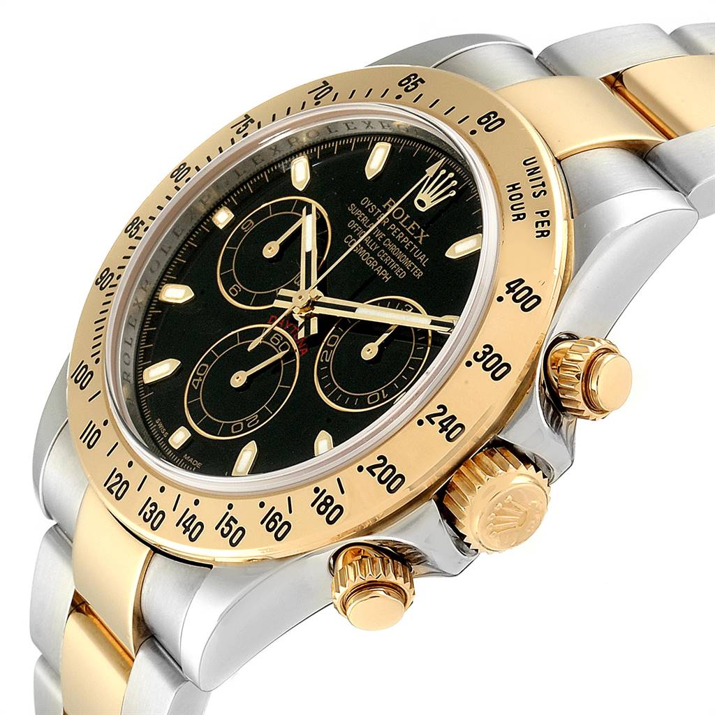 The image shows a partial side view of the Rolex Daytona 116523 Men
s Steel and Gold (two tone) Black Dial 116523 Men
s Steel and Gold (two tone) Black Dial watch, highlighting the gold bezel, black dial, and chronograph pushers.