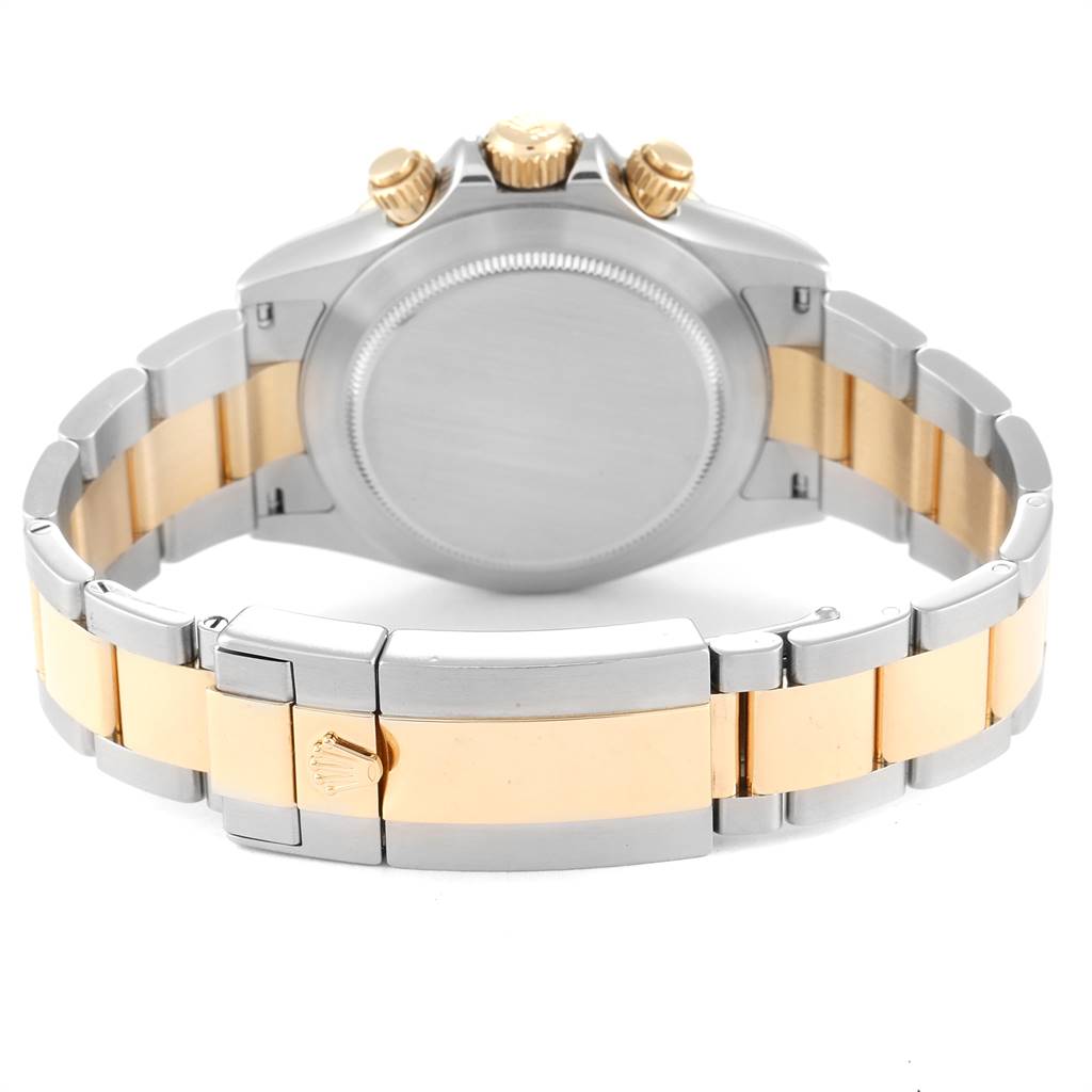 This image shows the back view of a Rolex Daytona 116523 Men
s Steel and Gold (two tone) Black Dial 116523 Men
s Steel and Gold (two tone) Black Dial watch, focusing on its stainless steel and gold bracelet and clasp.