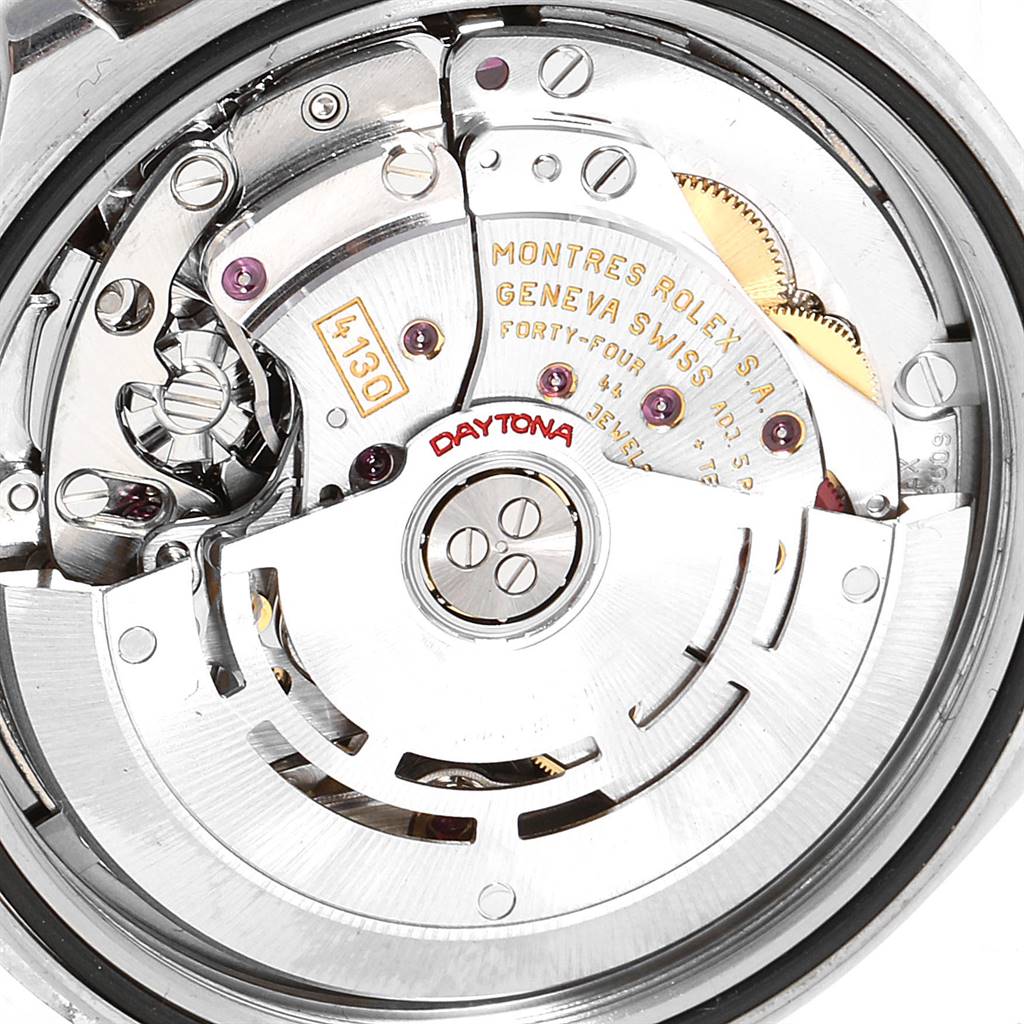 This image shows the internal movement mechanism of the Rolex Daytona 116523 Men's Steel and Gold (two tone) Mother of Pearl Dial 116523 Men's Steel and Gold (two tone) Mother of Pearl Dial watch from a close-up angle.