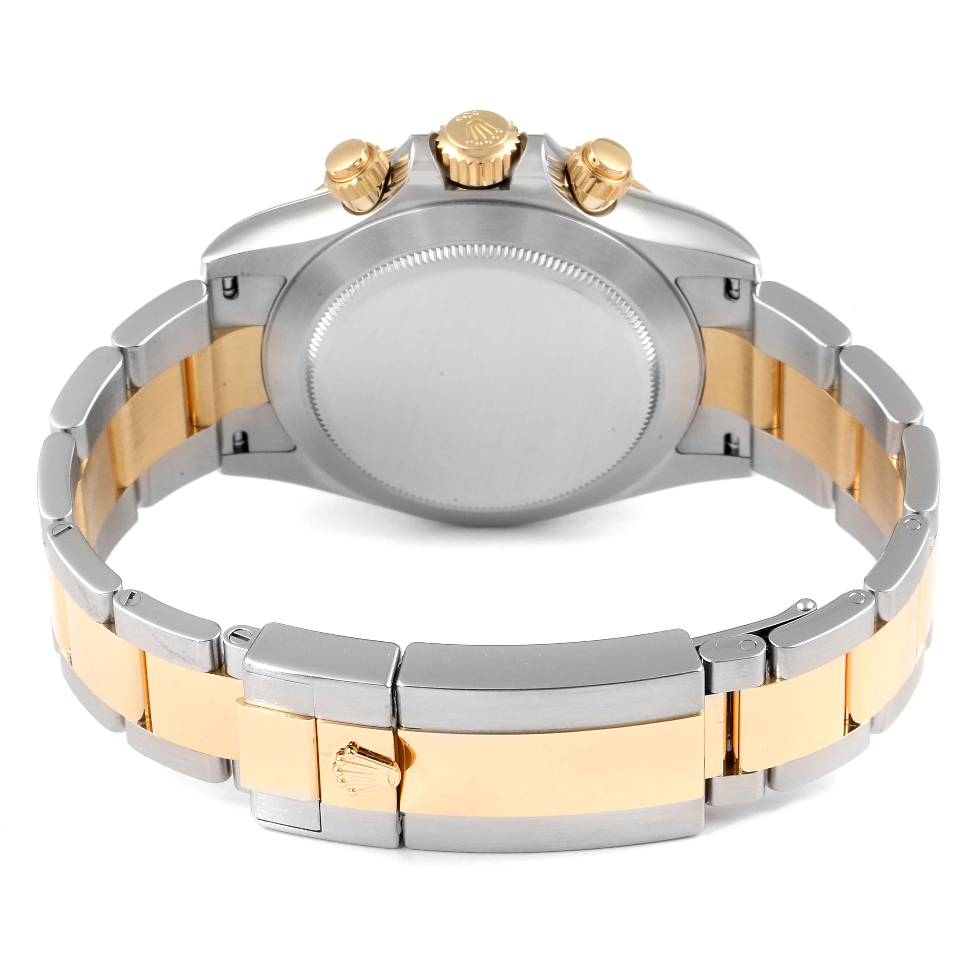 This image shows the back and bracelet of a Rolex Daytona 116503 Men's Steel and Gold (two tone) Black Dial 116503 Men's Steel and Gold (two tone) Black Dial watch, highlighting the clasp and crown from a rear angle.