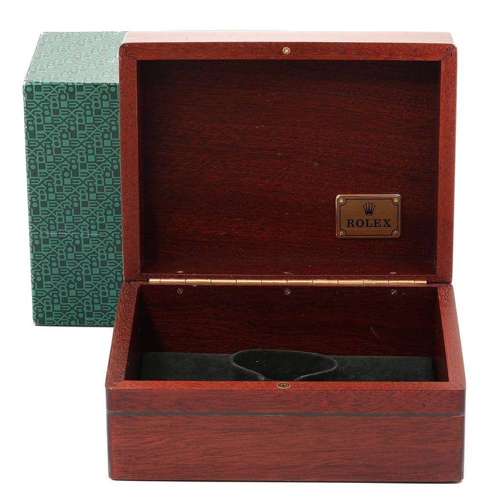 The image shows an open wooden box for the Rolex Daytona 16528 Men
s Yellow Gold Champagne Dial 16528 Men
s Yellow Gold Champagne Dial watch, with the official Rolex logo inside the lid.