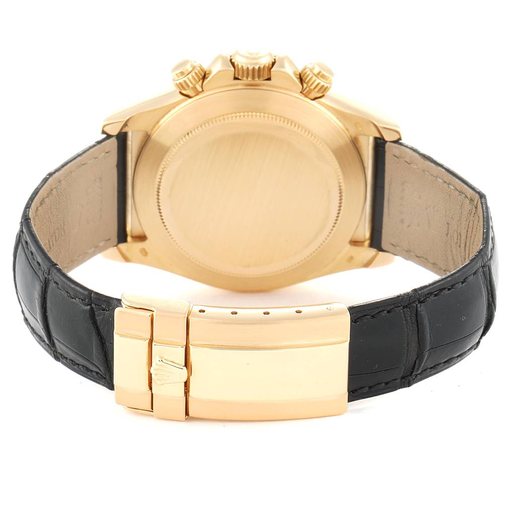 The image shows the back case and black leather strap with clasp of a Rolex Daytona 16518 Men's Yellow Gold White Dial 16518 Men's Yellow Gold White Dial watch.